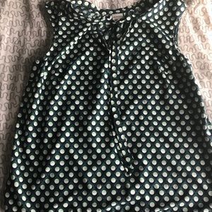 Green and black sleeveless blouse